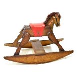 Vintage wooden child's rocking horse with red leather seat, measures approximately 50cm high x