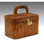 Vintage crocodile skin vanity or travel case, the red plush interior with mirror and removable