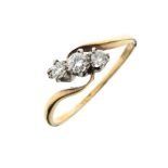 Yellow metal and three stone diamond dress ring of crossover design, shank stamped 9ct, size N, 1.4g