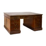 Reproduction mahogany partners desk having inset leather top fitted one side nine drawers, the