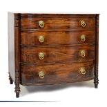 Early 19th Century mahogany bowfront chest of four long drawers having turned pilasters fitted brass