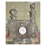 Waterford Crystal mantel clock, together with two glass decanters (3)