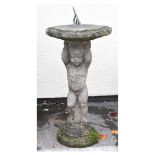 Composite stone garden figural sun dial, 92cm high