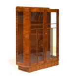 1930's period walnut display cabinet fitted two glass shelves enclosed by a pair of doors, 91cm wide