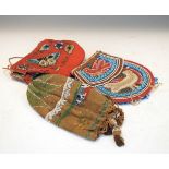 Oriental beadwork purse decorated butterfly and exotic bird, and two other beadwork purses