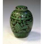 Sheldon Pottery ovoid jar and cover with foliate relief decoration, 19.5cm high