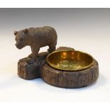 Black Forest desk tidy formed as a bear, stood beside a brass bowl, 9.5cm high