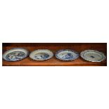 Four various Chinese blue and white porcelain plates to include; one decorated with a 'Long