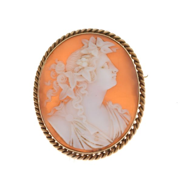 9ct gold shell cameo brooch carved with a female profile portrait of Flora, in 9ct gold rope-twist