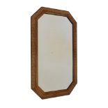 Early 20th Century oak framed rectangular bevelled glass mirror having canted corners, 80cm x 50cm