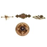 Four assorted gold and yellow metal bar brooches comprising: 15ct flowerhead brooch on navette-