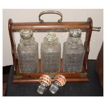 Mahogany-cased three bottle tantalus