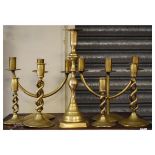 Assorted brass candlesticks to include; two pairs and a pair of three branch candelabra