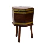 Georgian mahogany brass bound wine cooler having hexagonal hinged cover fitted two handled liner,