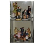 Group of nine Royal Doulton Classics wartime-related figures to include; The Hero Returns HN4698,