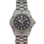 Tag Heuer - Gentleman's Professional Series stainless steel wristwatch, black dial with luminous
