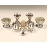 Collection of silver items to include; a pair of Victorian embossed table salts, Birmingham 1897,