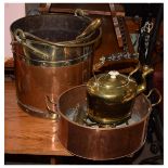 Early 20th Century brass and copper log/coal bin of cylindrical form, brass kettle and stand, oval