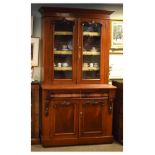 Victorian mahogany two section bookcase, the upper fitted three shelves enclosed by a pair of glazed