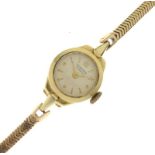 Junghans - Lady's 9ct gold wristwatch, champagne dial with Arabic 12, 19mm excluding winder, with