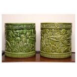 Pair of Bretby cylindrical green glazed jardinières depicting chinoiserie scenes, the bases with