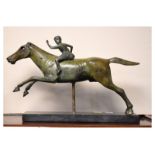 Antique style bronze of a figure on a galloping horse on slate plinth, 23cm overall height