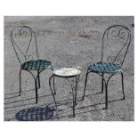 Green-painted metal bistro or patio set comprising: tile-top tripod table and pair of chairs
