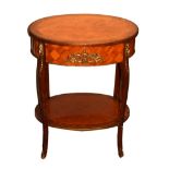 Reproduction French walnut oval two tier occasional table having gilt metal mounts, 54cm wide