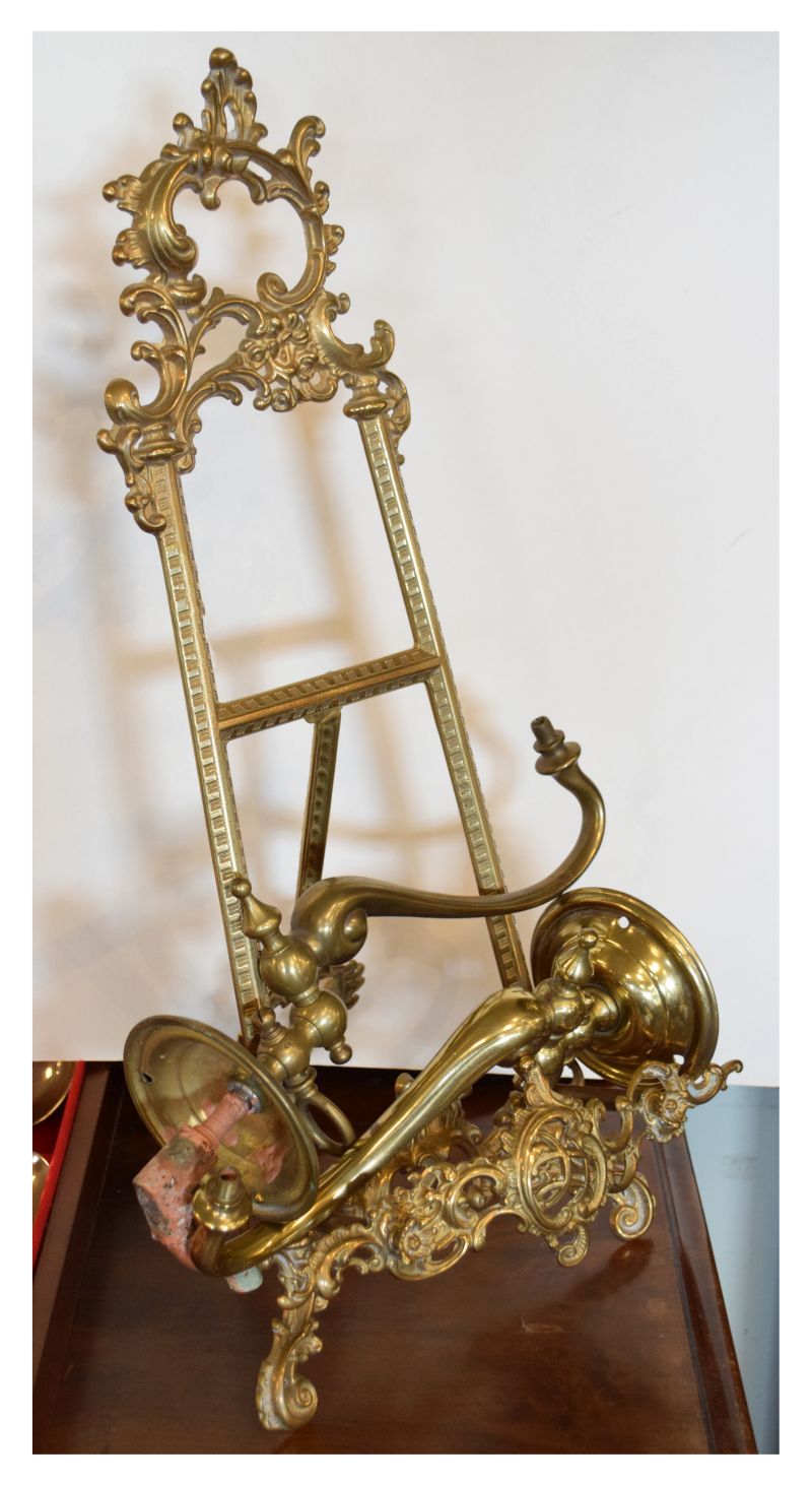 Brass easel stand and a pair of brass wall gas lights