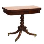 19th Century mahogany rectangular top fold-over tea table on central turned column and four scroll