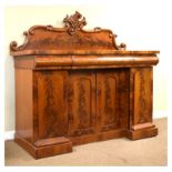 Victorian mahogany inverted breakfront sideboard having acanthus carved back, three frieze drawers