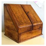 Late 19th/early 20th Century oak slope front stationery box, 31cm wide