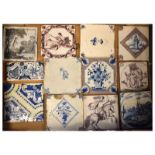 Group of 18th Century Delftware and other pottery tiles to include; seven manganese examples,