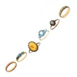 Six various 9ct gold and yellow metal rings, four hallmarked 9ct, one stamped 9k, the sixth