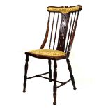 Early 20th Century beech occasional chair with pierced splat between spindles, serpentine-fronted