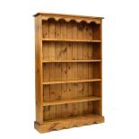 Stained pine open bookcase fitted four shelves, 98cm wide