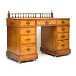 Late 19th Century birch dressing table/kneehole desk fitted nine drawers, 120cm wide