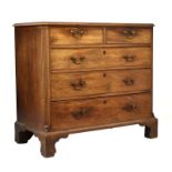 George III mahogany chest of two short over three long graduated drawers having canted fluted