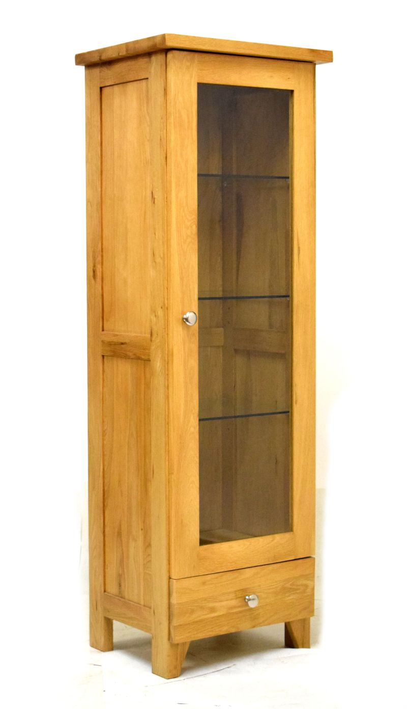 Modern oak display cabinet fitted three glass shelves and four below, 130cm high