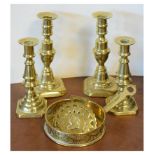 Two pairs of Victorian brass candlesticks, chamber stick and a horsebrass