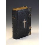 19th Century leather bound Bible having crucifix mount to front