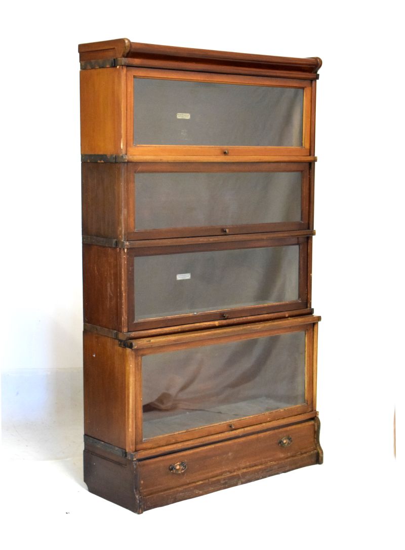 Globe Wernicke mahogany four section bookcase fitted up-and-over doors, 86cm wide