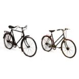 Two mid 20th Century bicycles, gentleman's with rod brakes, single speed, and a lady's Raleigh