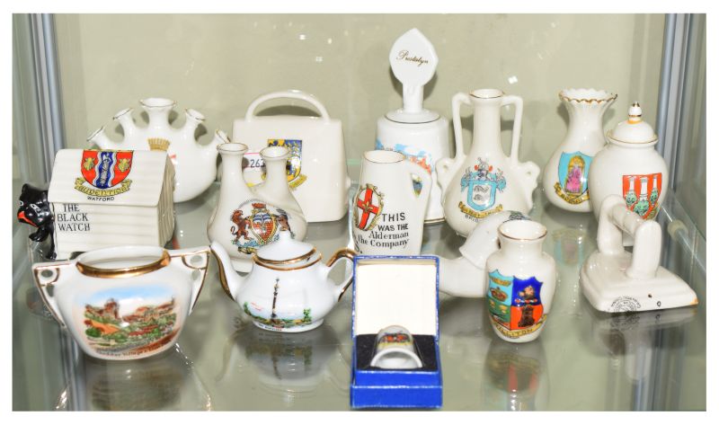 Group of crested ware china including 'Black Watch' bulldog in kennel, snail, Lincoln 'Alderman