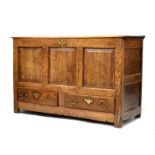 18th Century oak mule chest having hinged cover and two drawers to base, 145cm wide