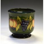 Moorcroft pottery Fruit pattern jardinière tube lined with grapes and peaches on a shaded green