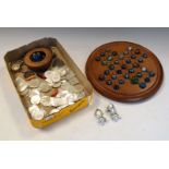 Collection of vintage gaming items comprising: marble solitaire set, mother-of-pearl gaming tokens