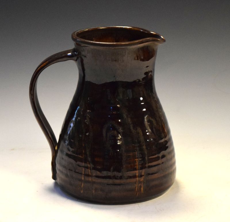 Margaret Leach - Mid 20th Century studio pottery jug of ribbed bulbous form with brown treacle