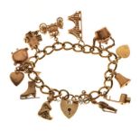 9ct gold curb-link charm bracelet with heart-shaped padlock and twelve assorted gold and yellow