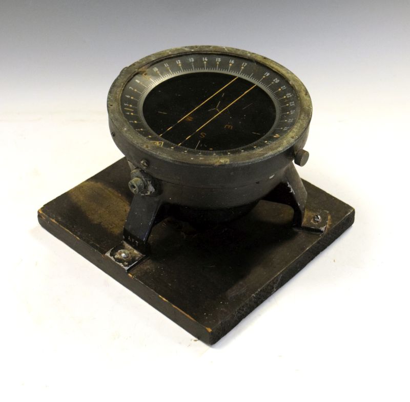 World War II era Air Force type Navigation Compass, with black dial and outer ring on tripod